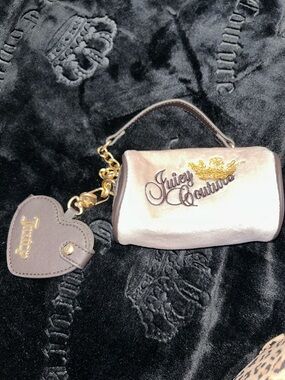 Juicy Couture mini bag with detachable mirror.